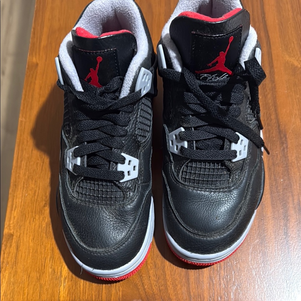 Jordan Black and Red Sneakers Iconic Air Cushioning